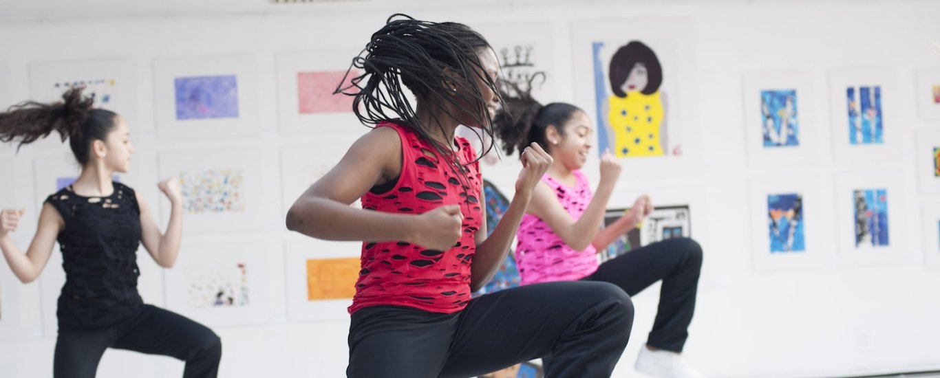 Creative Art and Dance Students dancing in a performance