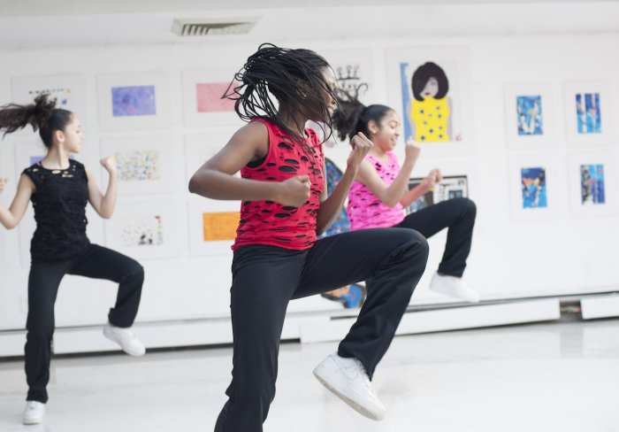 Students dancing in a performance