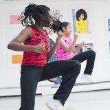 Students dancing in a performance